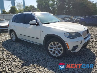 Czwarte zdjęcie samochodu z boku: 2013 BMW X5 XDRIVE35I VIN:5UXZV4C57D0B20960 - miniatura