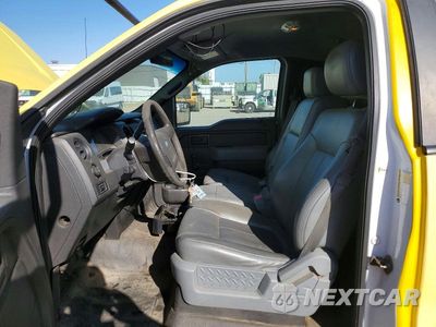 Zdjęcie 7 z 12 samochodu: 2014 FORD F150 VIN:1FTMF1CM9EKF26692 - miniatura