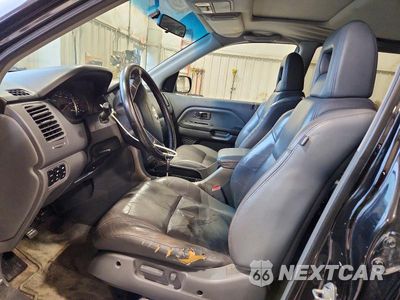Zdjęcie 7 z 13 samochodu: 2005 HONDA PILOT EXL VIN:5FNYF185X5B052574 - miniatura