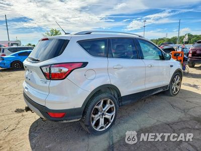 Trzecie zdjęcie samochodu z tyłu: 2017 FORD ESCAPE TITANIUM VIN:1FMCU9J95HUD58391 - miniatura