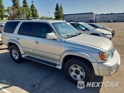 Czwarte zdjęcie samochodu z boku: 1999 TOYOTA 4RUNNER LIMITED VIN:JT3GN87R6X0124470 - miniatura