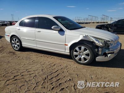 Czwarte zdjęcie samochodu z boku: 2004 JAGUAR X-TYPE 3.0 VIN:SAJEA51C14WE00049 - miniatura