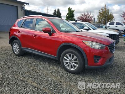 Czwarte zdjęcie samochodu z boku: 2016 MAZDA CX-5 TOURING VIN:JM3KE4CY5G0830333 - miniatura