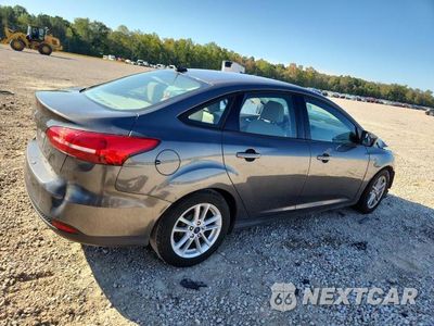 Trzecie zdjęcie samochodu z tyłu: 2018 FORD FOCUS SE VIN:1FADP3F29JL267859 - miniatura