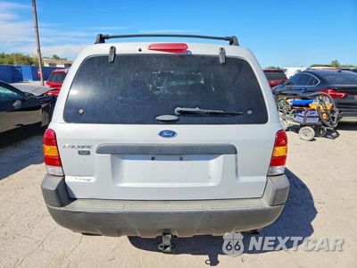 Zdjęcie 6 z 13 samochodu: 2002 FORD ESCAPE XLT VIN:1FMCU04192KD66109 - miniatura