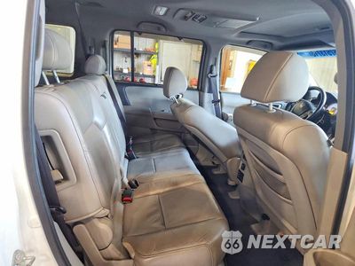 Zdjęcie 11 z 13 samochodu: 2011 HONDA PILOT TOURING VIN:5FNYF4H92BB049121 - miniatura