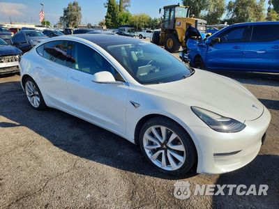 Czwarte zdjęcie samochodu z boku: 2019 TESLA MODEL 3 VIN:5YJ3E1EB2KF512572 - miniatura