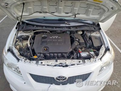 Zdjęcie 11 z 13 samochodu: 2010 TOYOTA COROLLA LE VIN:1NXBU4EE7AZ212246 - miniatura