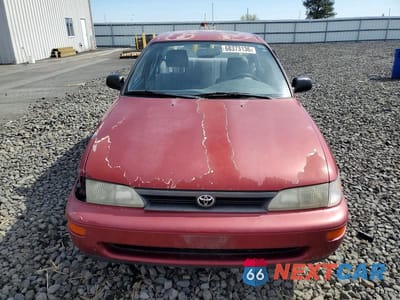 Piąte zdjęcie samochodu w środku: 1994 TOYOTA COROLLA BASE VIN:JT2AE04B2R0085981 - miniatura