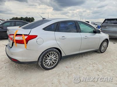 Trzecie zdjęcie samochodu z tyłu: 2012 FORD FOCUS SEL VIN:1FAHP3H24CL430239 - miniatura