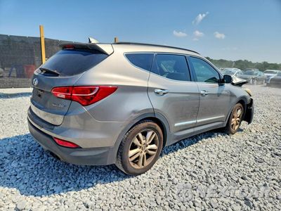 Trzecie zdjęcie samochodu z tyłu: 2013 HYUNDAI SANTA FE SPORT 2.0T VIN:5XYZU3LA0DG073094 - miniatura