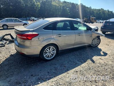 Trzecie zdjęcie samochodu z tyłu: 2015 FORD FOCUS TITANIUM VIN:1FADP3J25FL259143 - miniatura