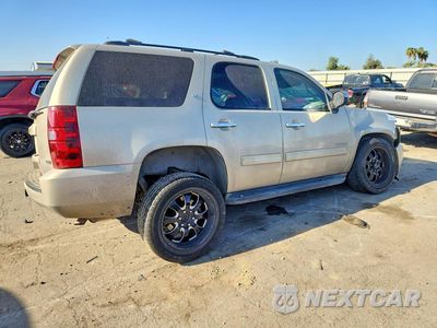 Trzecie zdjęcie samochodu z tyłu: 2010 CHEVROLET TAHOE C1500 LT VIN:1GNUCBE09AR218813 - miniatura
