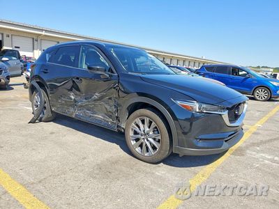 Czwarte zdjęcie samochodu z boku: 2021 MAZDA CX-5 GRAND TOURING RESERVE VIN:JM3KFBAY2M0451760 - miniatura