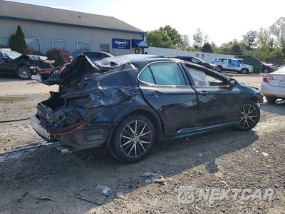 Trzecie zdjęcie samochodu z tyłu: 2024 TOYOTA CAMRY SE VIN:4T1G11AK9RU878576 - miniatura