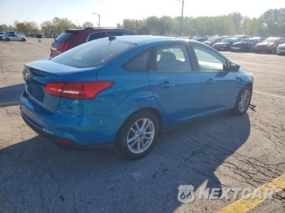 Trzecie zdjęcie samochodu z tyłu: 2017 FORD FOCUS SE VIN:1FADP3F2XHL236856 - miniatura