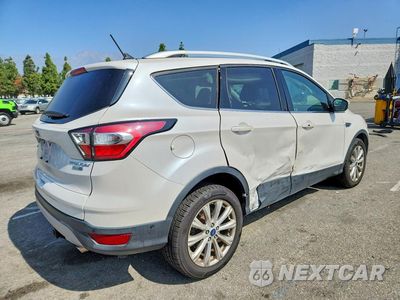 Trzecie zdjęcie samochodu z tyłu: 2018 FORD ESCAPE TITANIUM VIN:1FMCU9J9XJUA24668 - miniatura
