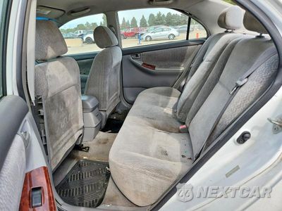 Zdjęcie 10 z 13 samochodu: 2003 TOYOTA COROLLA LE VIN:1NXBR32E63Z041718 - miniatura