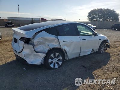 Trzecie zdjęcie samochodu z tyłu: 2023 TESLA MODEL Y VIN:7SAYGDEE4PA088752 - miniatura