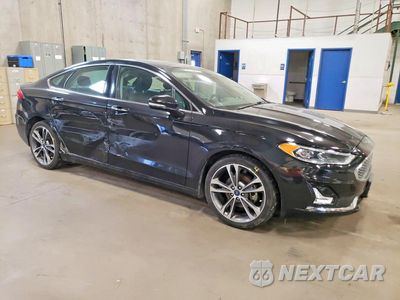 Czwarte zdjęcie samochodu z boku: 2020 FORD FUSION TITANIUM VIN:3FA6P0D90LR178354 - miniatura