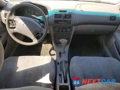 Zdjęcie 8 z 13 samochodu: 1999 TOYOTA COROLLA VE VIN:1NXBR12EXXZ165064 - miniatura