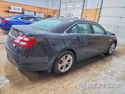 Trzecie zdjęcie samochodu z tyłu: 2014 FORD TAURUS SEL VIN:1FAHP2E91EG113008 - miniatura