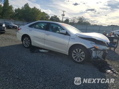 Czwarte zdjęcie samochodu z boku: 2015 TOYOTA CAMRY HYBRID XLE VIN:4T1BD1FK0FU160162 - miniatura