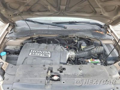 Zdjęcie 12 z 13 samochodu: 2006 HONDA PILOT EX VIN:5FNYF28606B019485 - miniatura