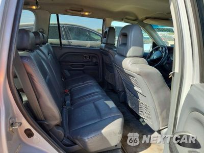 Zdjęcie 10 z 12 samochodu: 2003 HONDA PILOT EXL VIN:2HKYF18523H564599 - miniatura