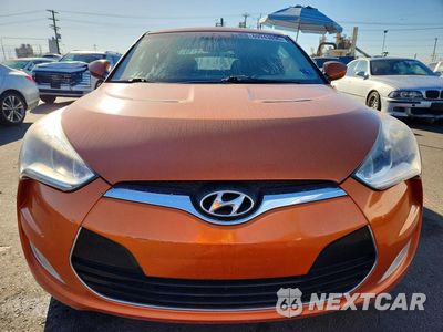 Piąte zdjęcie samochodu w środku: 2012 HYUNDAI VELOSTER BASE VIN:KMHTC6AD6CU041430 - miniatura