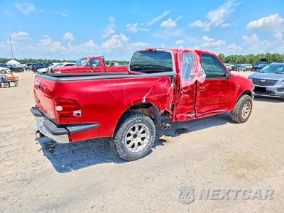 Trzecie zdjęcie samochodu z tyłu: 1997 FORD F150 LARIAT VIN:1FTDX0760VKD19286 - miniatura