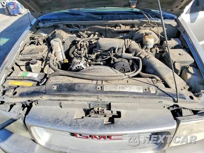 Zdjęcie 12 z 13 samochodu: 2000 GMC JIMMY VIN:1GKCS18W3YK260550 - miniatura