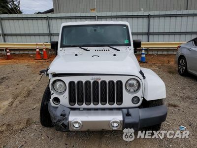 Piąte zdjęcie samochodu w środku: 2017 JEEP WRANGLER UNLIMITED SAHARA VIN:1C4BJWEG5HL662536 - miniatura