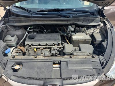 Zdjęcie 12 z 13 samochodu: 2012 HYUNDAI TUCSON GLS VIN:KM8JUCAC0CU487342 - miniatura