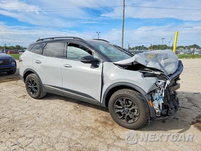 Czwarte zdjęcie samochodu z boku: 2023 KIA SPORTAGE X-PRO VIN:5XYK7CAF9PG085126 - miniatura