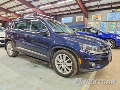 Czwarte zdjęcie samochodu z boku: 2015 VOLKSWAGEN TIGUAN S VIN:WVGBV7AX8FW611300 - miniatura
