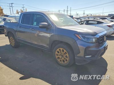 Czwarte zdjęcie samochodu z boku: 2022 HONDA RIDGELINE RTL VIN:5FPYK3F50NB002848 - miniatura