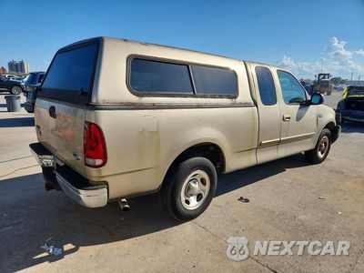 Trzecie zdjęcie samochodu z tyłu: 1999 FORD F150 VIN:1FTZX1722XNB99078 - miniatura