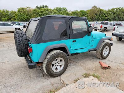 Trzecie zdjęcie samochodu z tyłu: 1997 JEEP WRANGLER / TJ SPORT VIN:1J4FY19S3VP521851 - miniatura