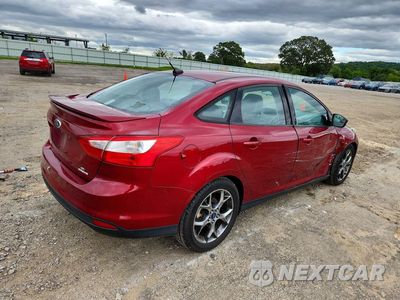 Trzecie zdjęcie samochodu z tyłu: 2014 FORD FOCUS SE VIN:1FADP3F21EL395910 - miniatura