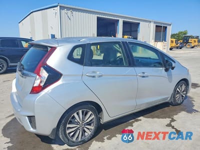 Trzecie zdjęcie samochodu z tyłu: 2016 HONDA FIT EX VIN:JHMGK5H75GX042123 - miniatura