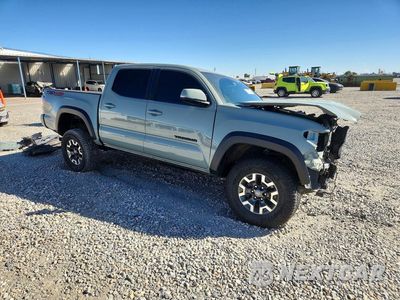 Czwarte zdjęcie samochodu z boku: 2022 TOYOTA TACOMA TRD OFF-ROAD VIN:3TMCZ5AN9NM498701 - miniatura