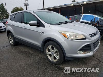 Czwarte zdjęcie samochodu z boku: 2014 FORD ESCAPE SE VIN:1FMCU9GXXEUD17255 - miniatura