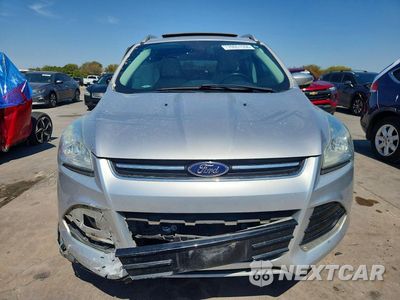 Piąte zdjęcie samochodu w środku: 2016 FORD ESCAPE TITANIUM VIN:1FMCU0JX3GUC57374 - miniatura