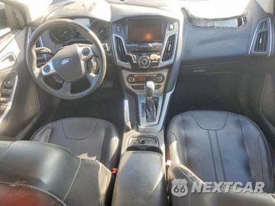 Zdjęcie 8 z 12 samochodu: 2012 FORD FOCUS TITANIUM VIN:1FAHP3J21CL365473 - miniatura