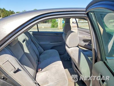 Zdjęcie 10 z 13 samochodu: 2003 TOYOTA CAMRY LE VIN:4T1BE30K23U749954 - miniatura
