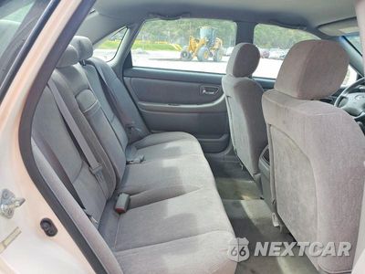 Zdjęcie 10 z 12 samochodu: 2003 TOYOTA AVALON XL VIN:4T1BF28BX3U271231 - miniatura