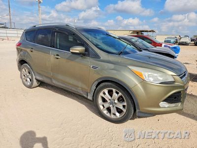 Czwarte zdjęcie samochodu z boku: 2014 FORD ESCAPE TITANIUM VIN:1FMCU0J99EUA39843 - miniatura