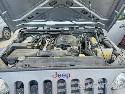 Zdjęcie 12 z 13 samochodu: 2017 JEEP WRANGLER UNLIMITED SPORT VIN:1C4HJWDG2HL674137 - miniatura