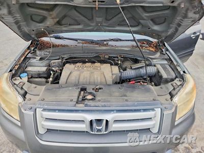 Zdjęcie 12 z 13 samochodu: 2007 HONDA PILOT EXL VIN:2HKYF18647H509604 - miniatura
